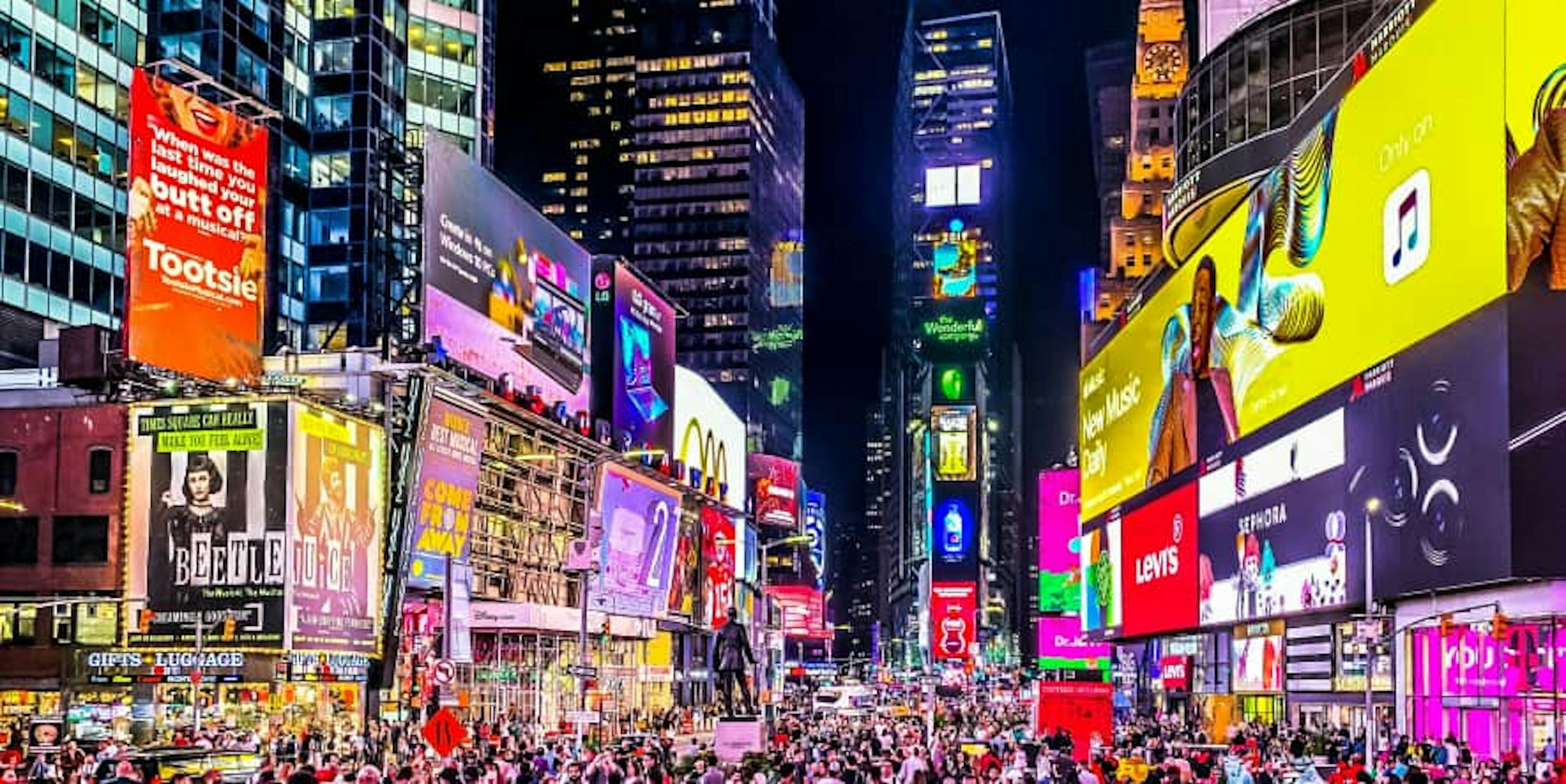 times square colorful and crowded at night