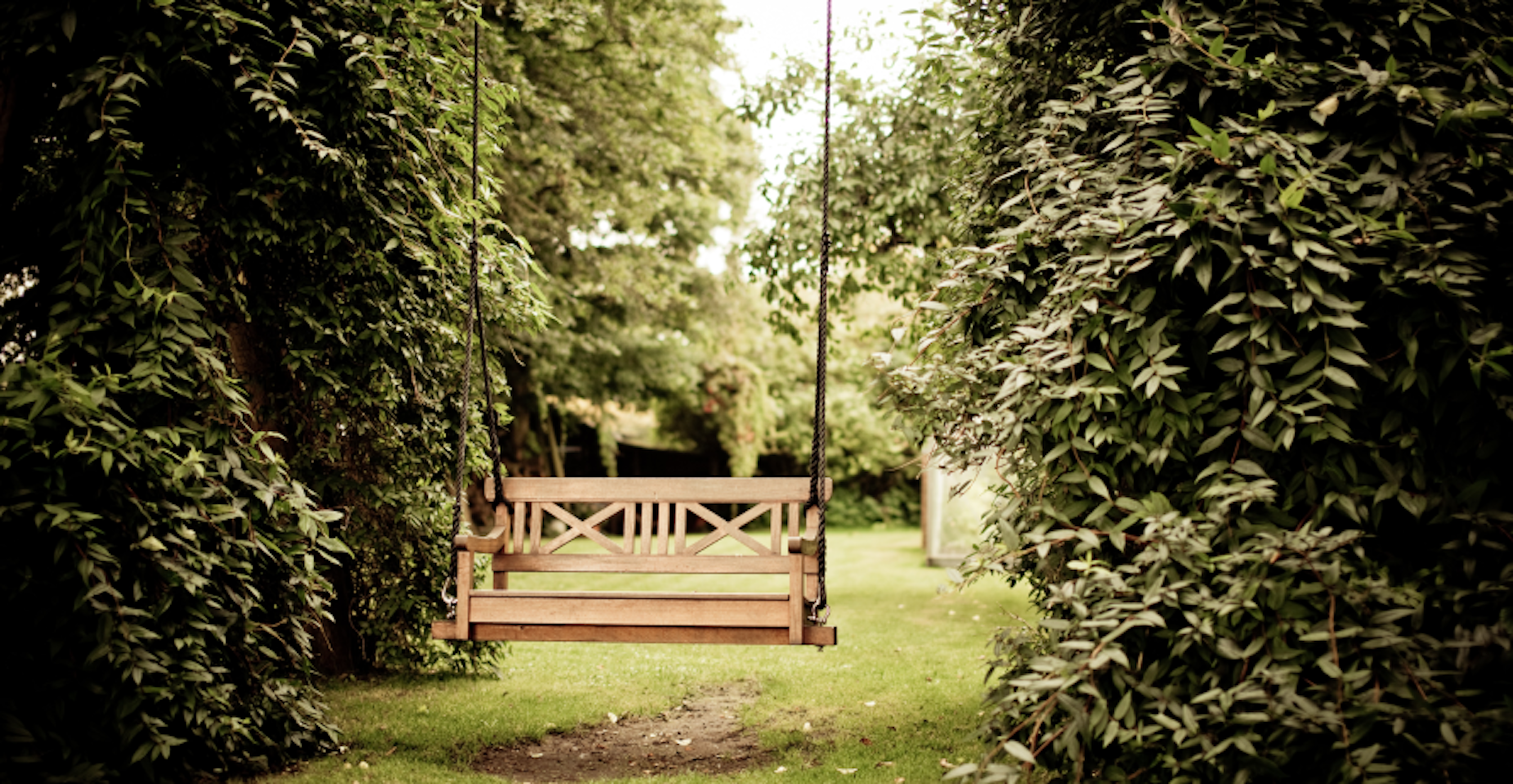 swinging bench in a garden