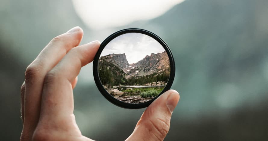 looking at mountains through magnifying glass