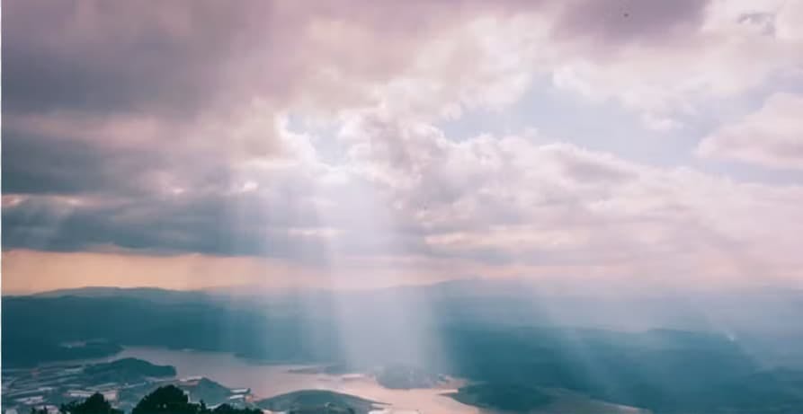 Landscape light rays through clouds 