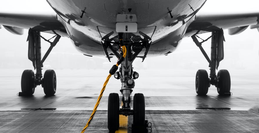 plane being fuelled on tarmac
