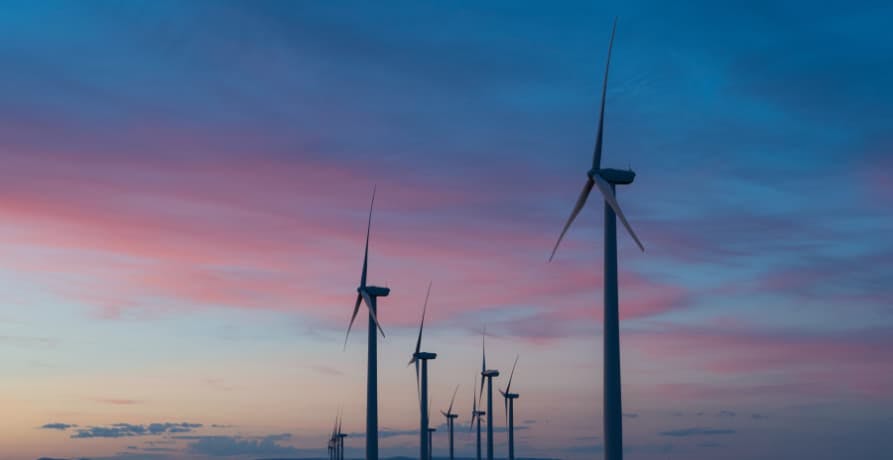 wind turbines in blue sunset