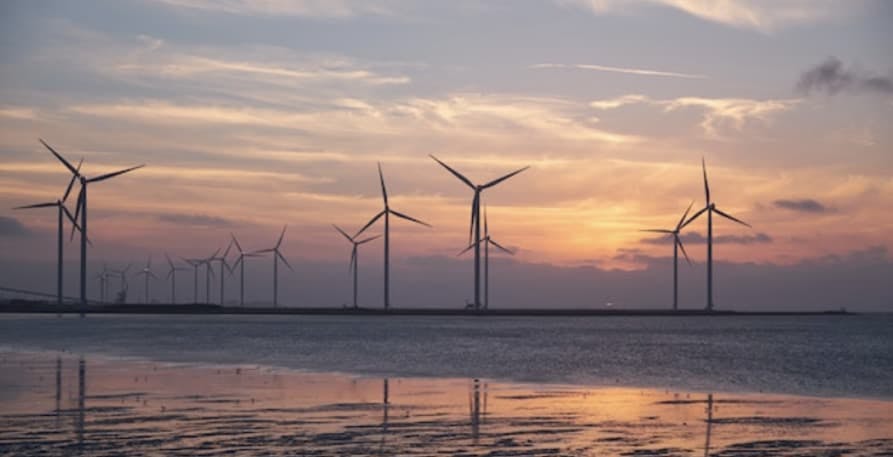 wind turbines in sunset