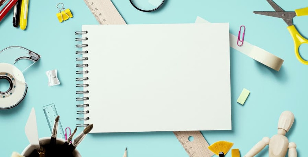 back to school supplies and giant blank white notepad
