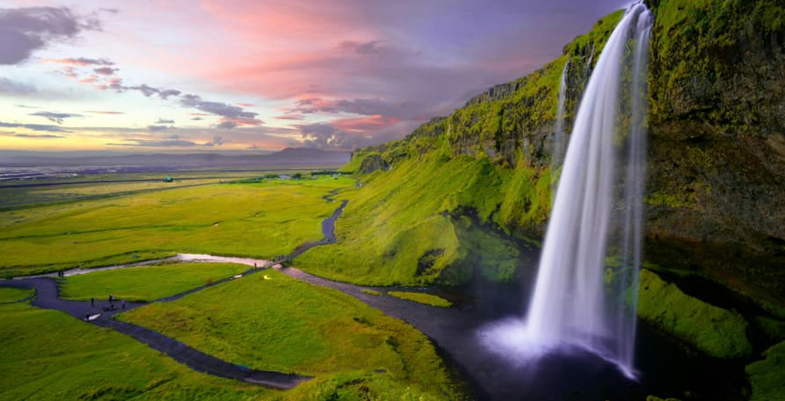 giant waterfall and green area