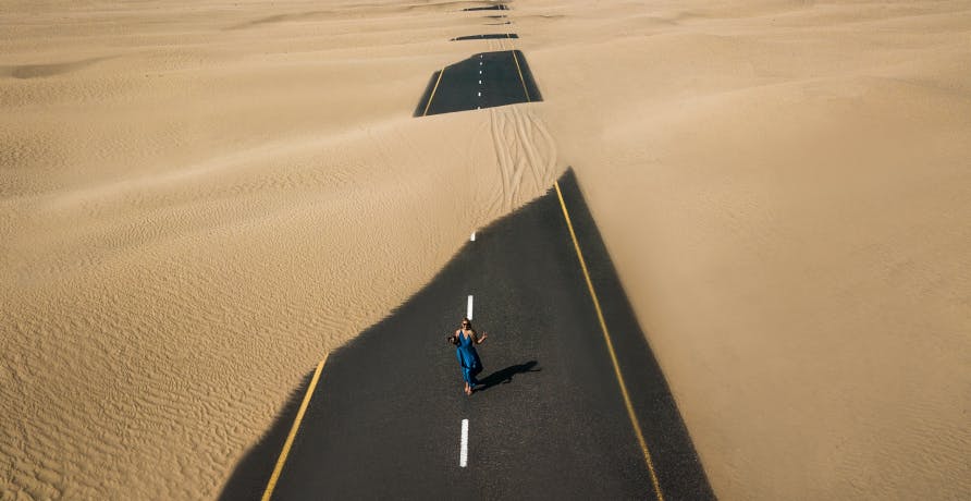 sandy road in desert