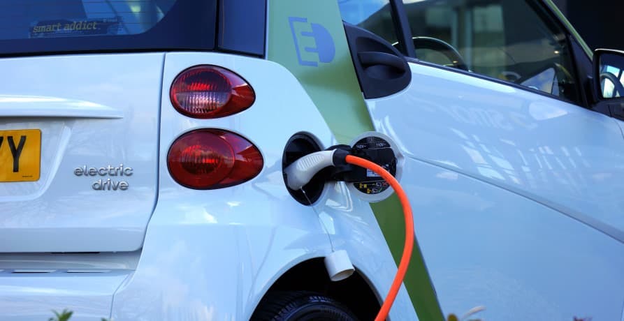 filling up a car with gas or electric power