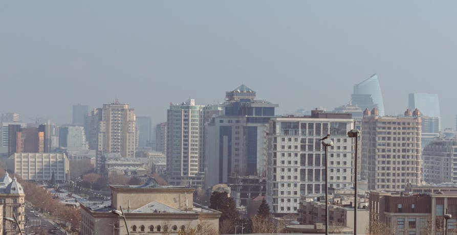 Polluted city with buildings and hazed air