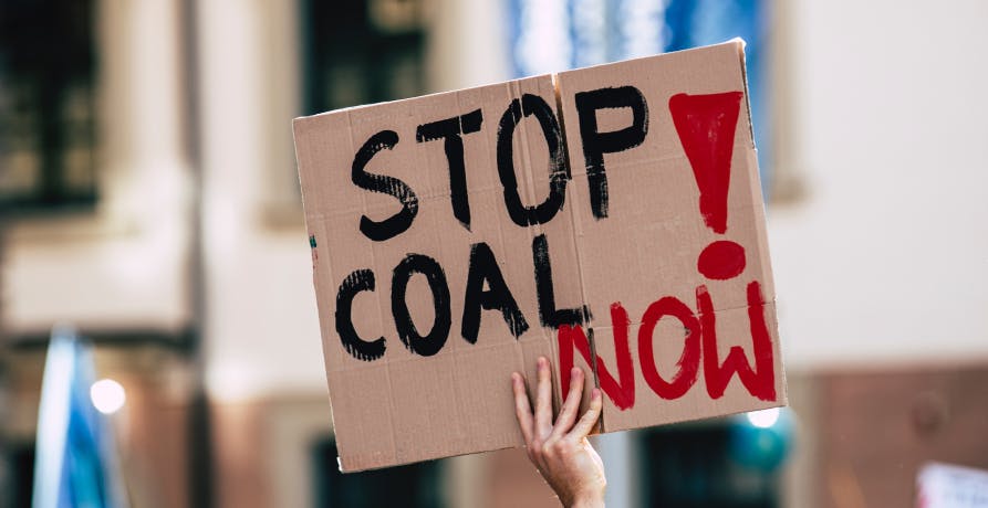 pancarte manifestation pour arrêter le charbon