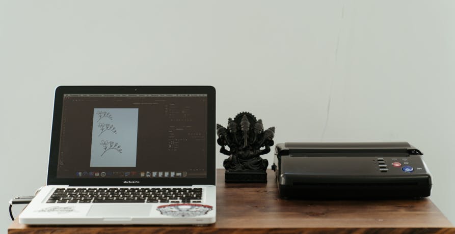 computer and printer on desk