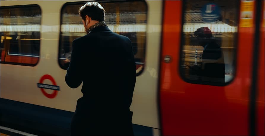 Man waiting on station platform