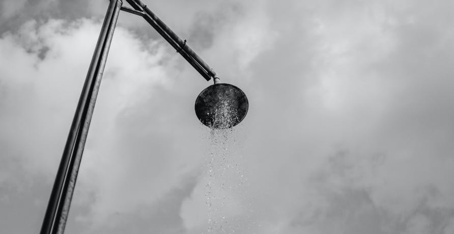shower outside in cloudy sky