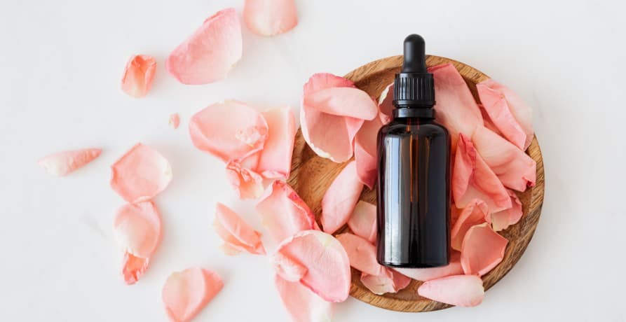 rose oil in rose petals