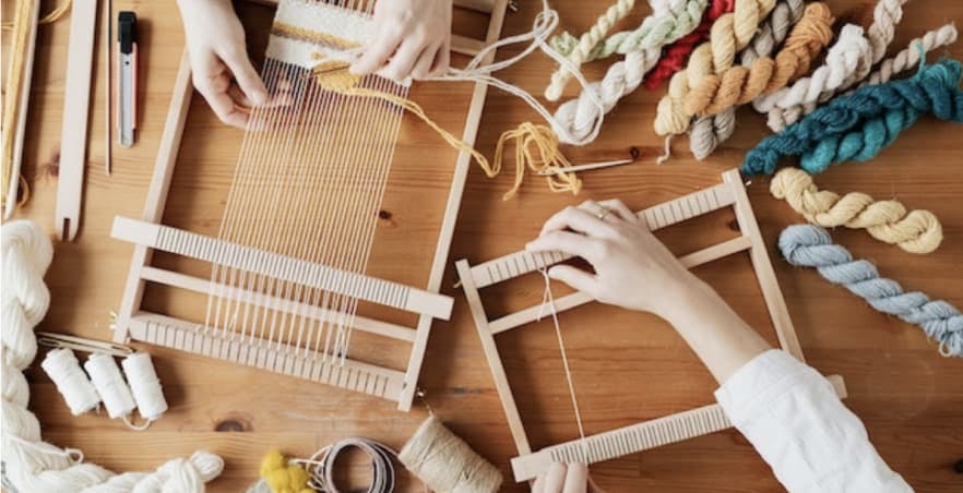 Top View Photo of Person Weaving