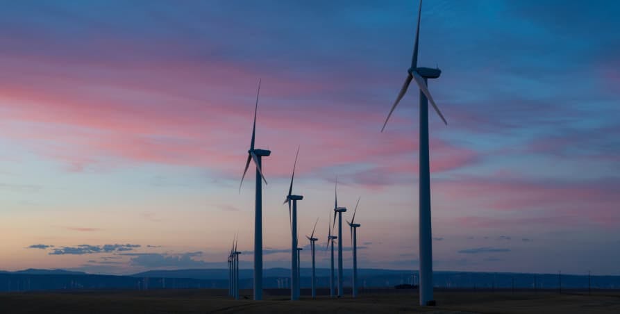 wind turbines at end of sunset