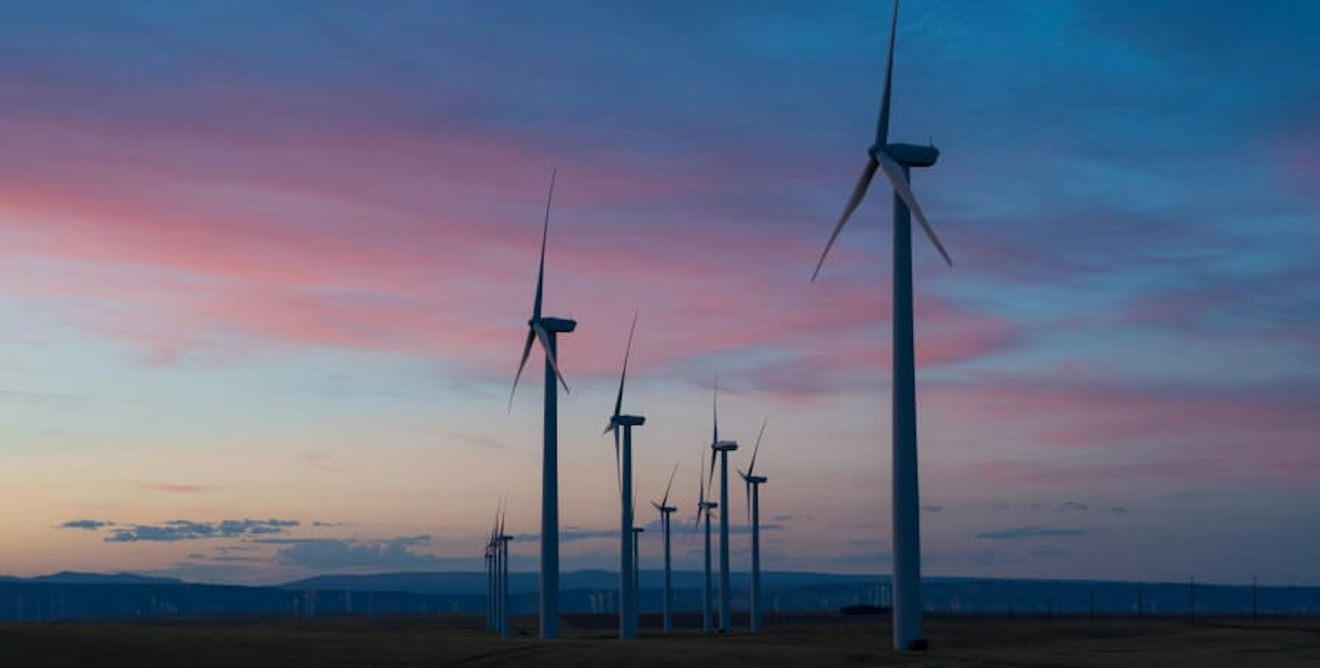 wind turbines at end of sunset