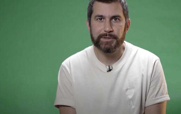 a man with green background