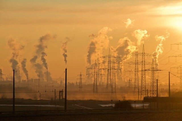 Air pollution smoke from pipes and factory 
