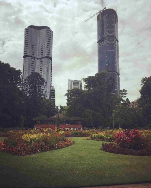 Tall buildings and green garden