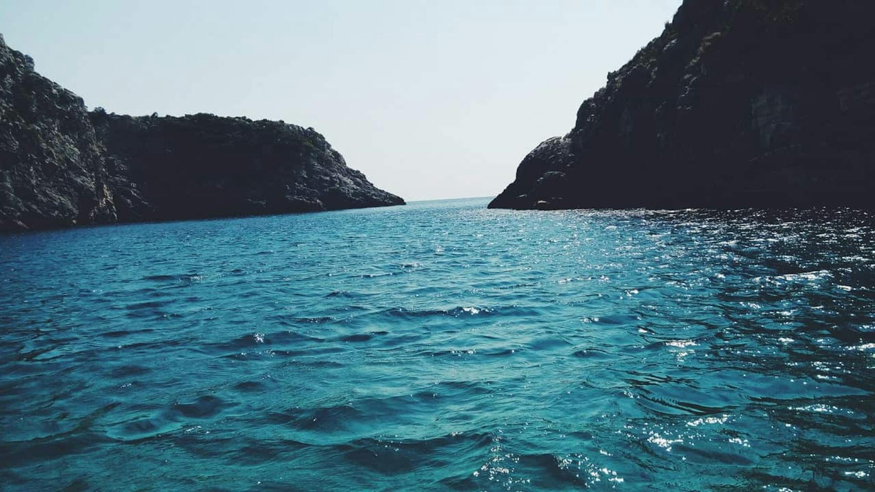 Sea surrounded by mountains 