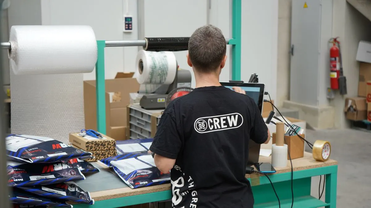Warehouse personnel conducting a stock check as part of supplier mapping