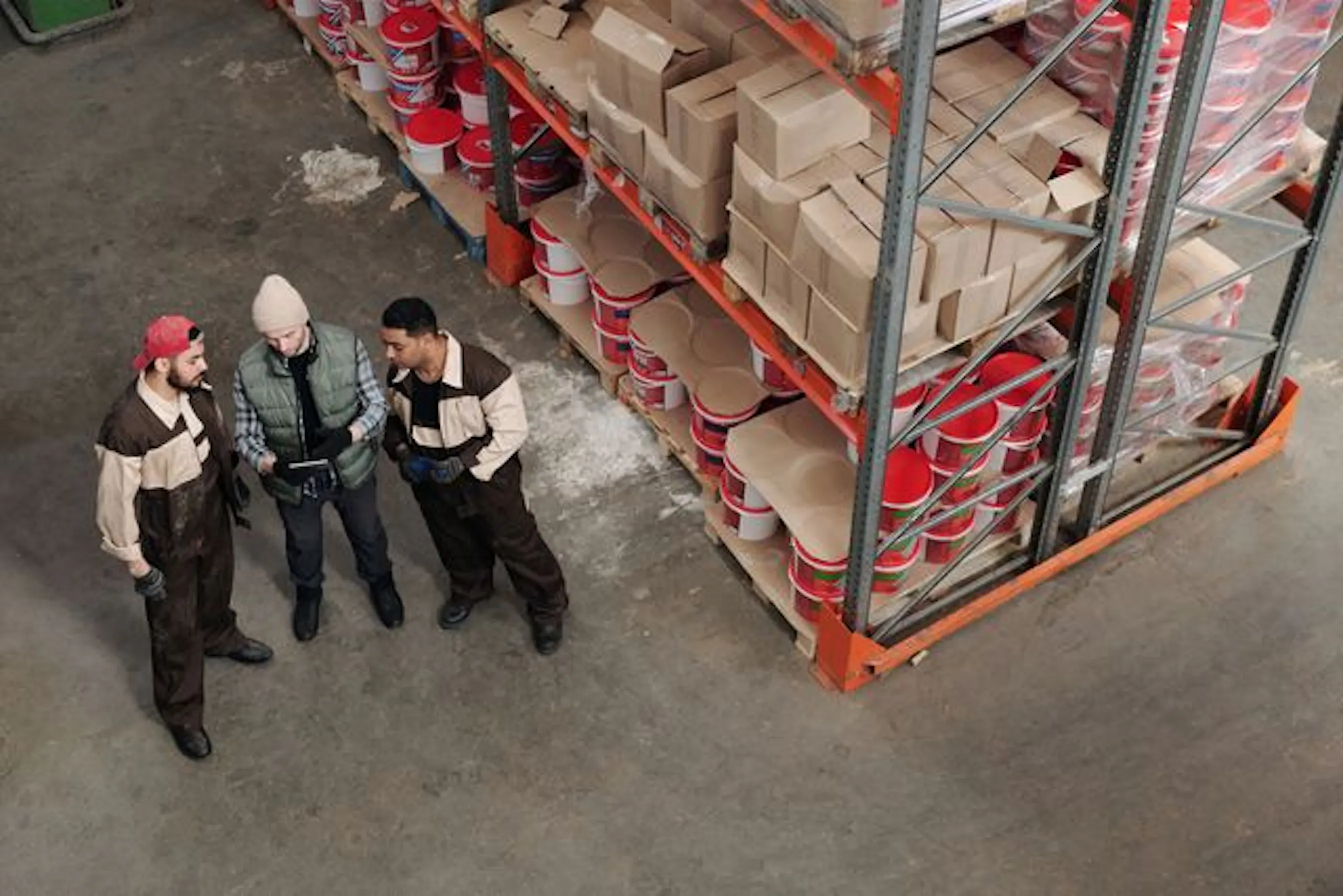 team checking supply chain planning in a warehouse