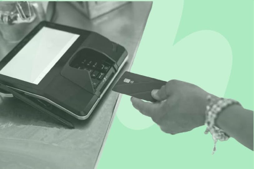 person paying with credit card