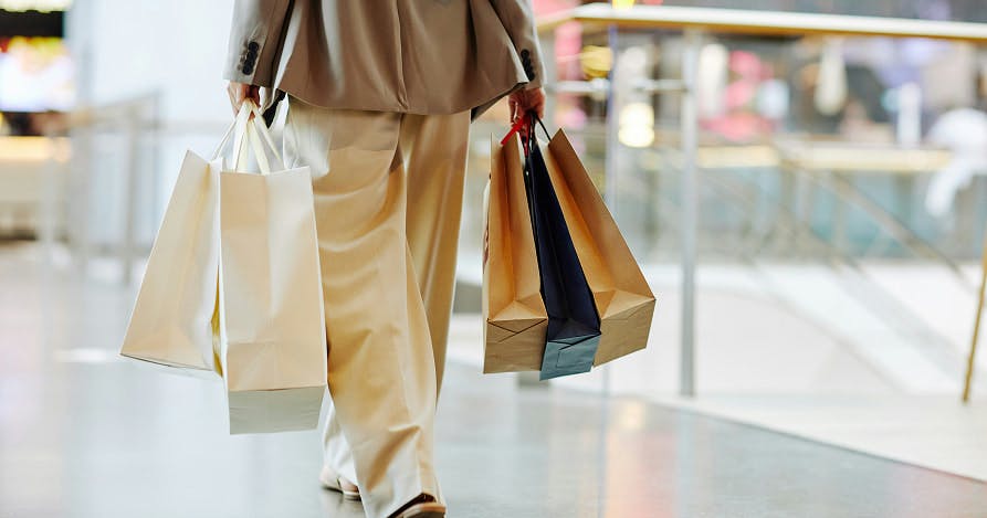 person with shopping bags