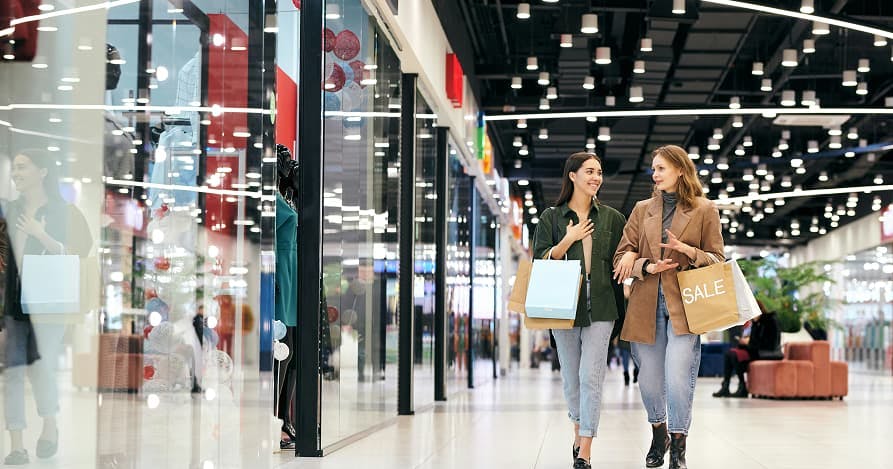 two girls shopping together