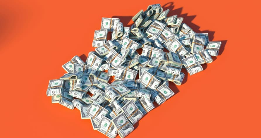 money on orange background