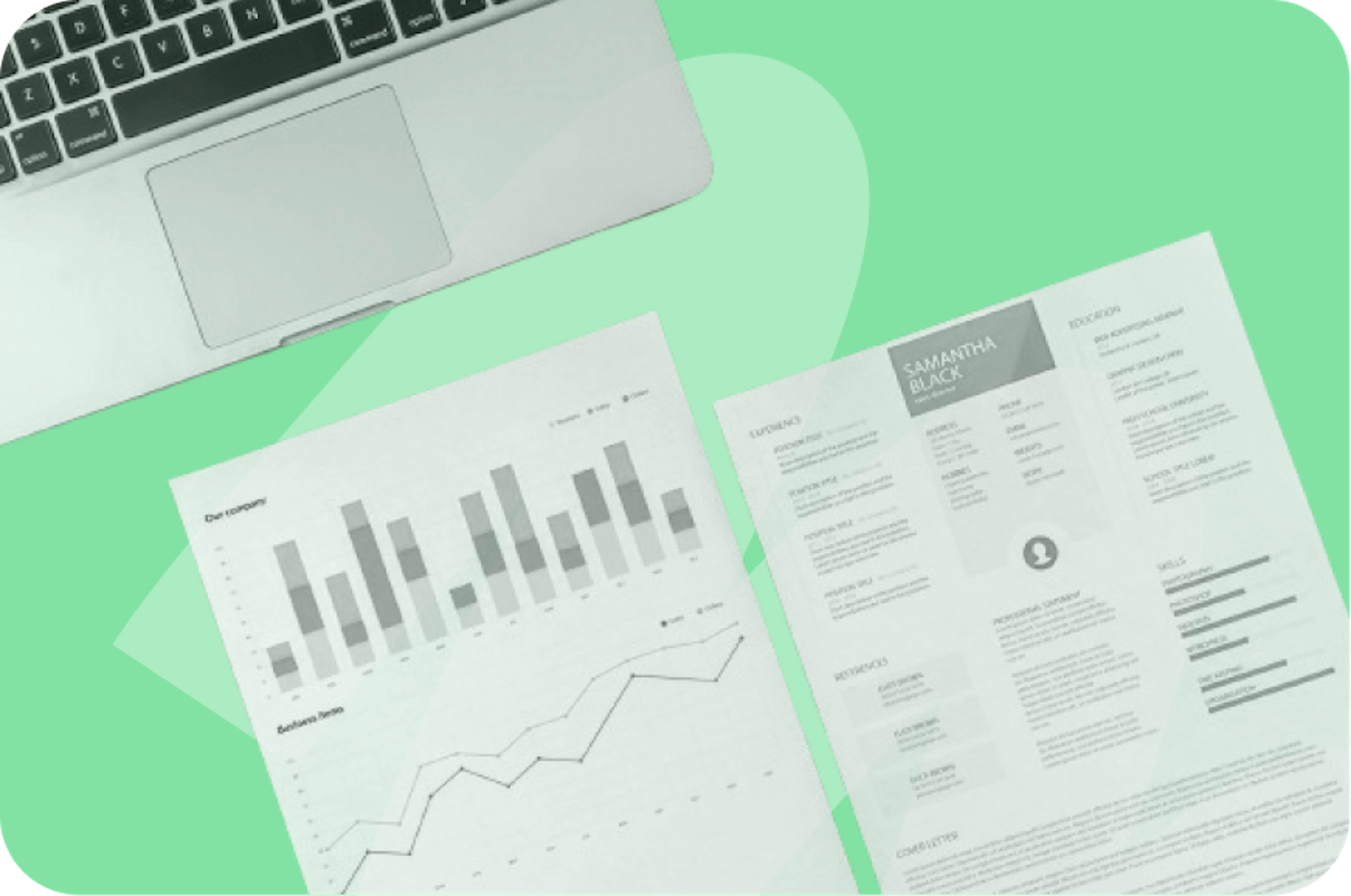 un ordinateur et des feuilles de papier avec des graphiques sur fond vert