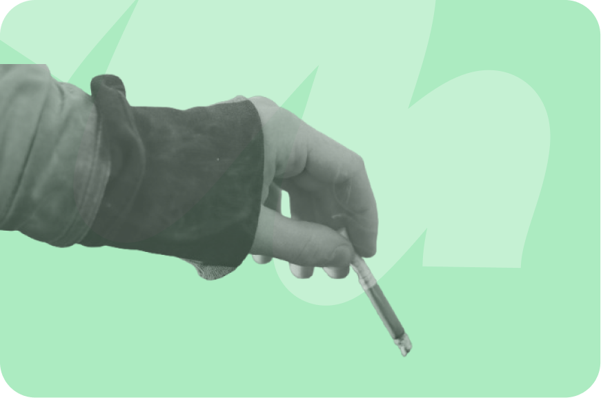 person holding a cigarette butt