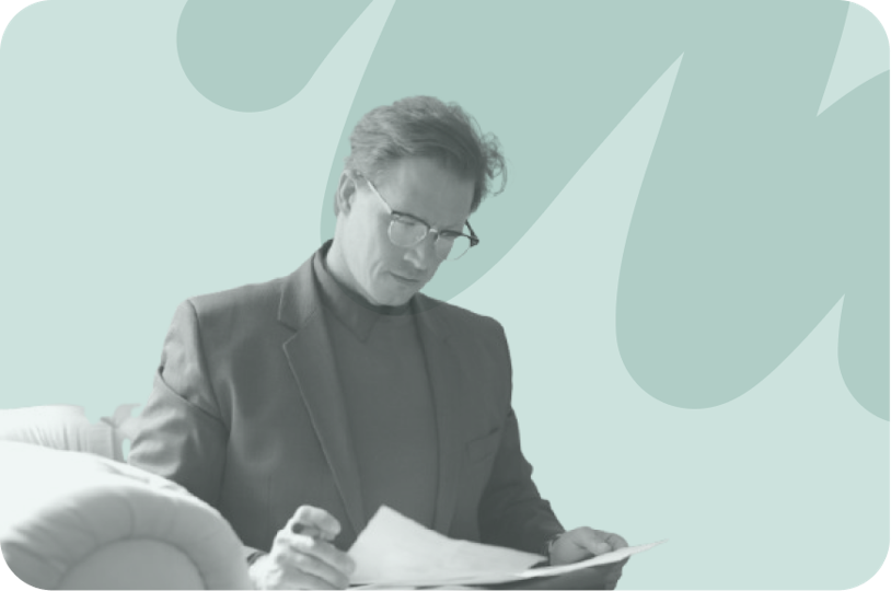 man looking at documents