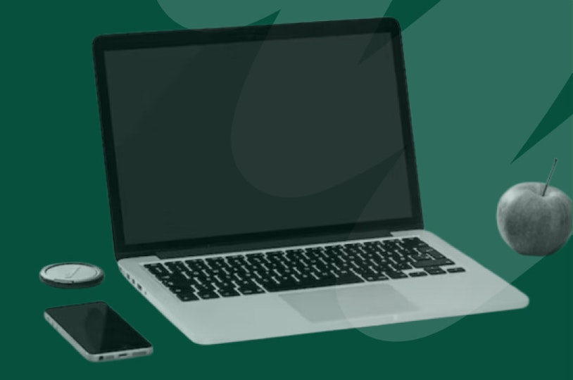 laptop with phone and apple
