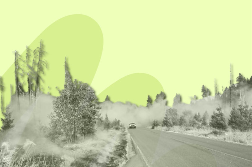 car driving through wildfire