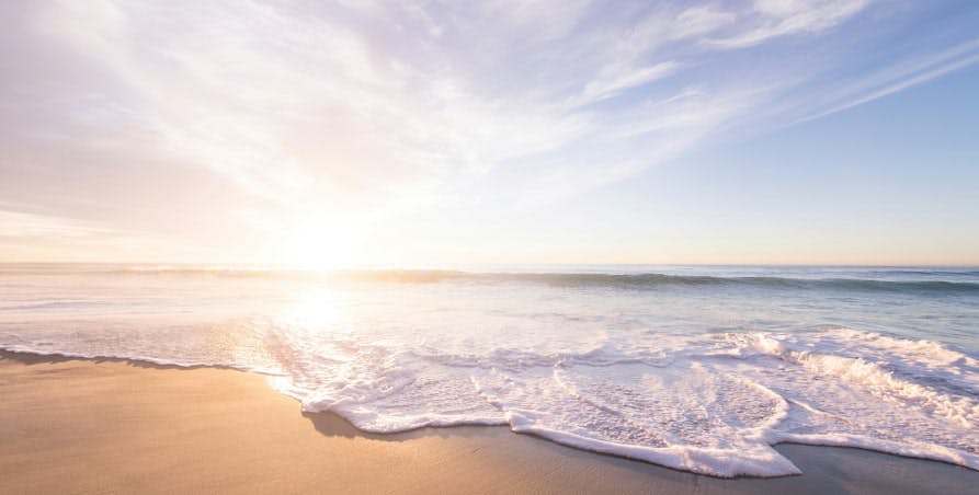 ocean waves crashing onto shore