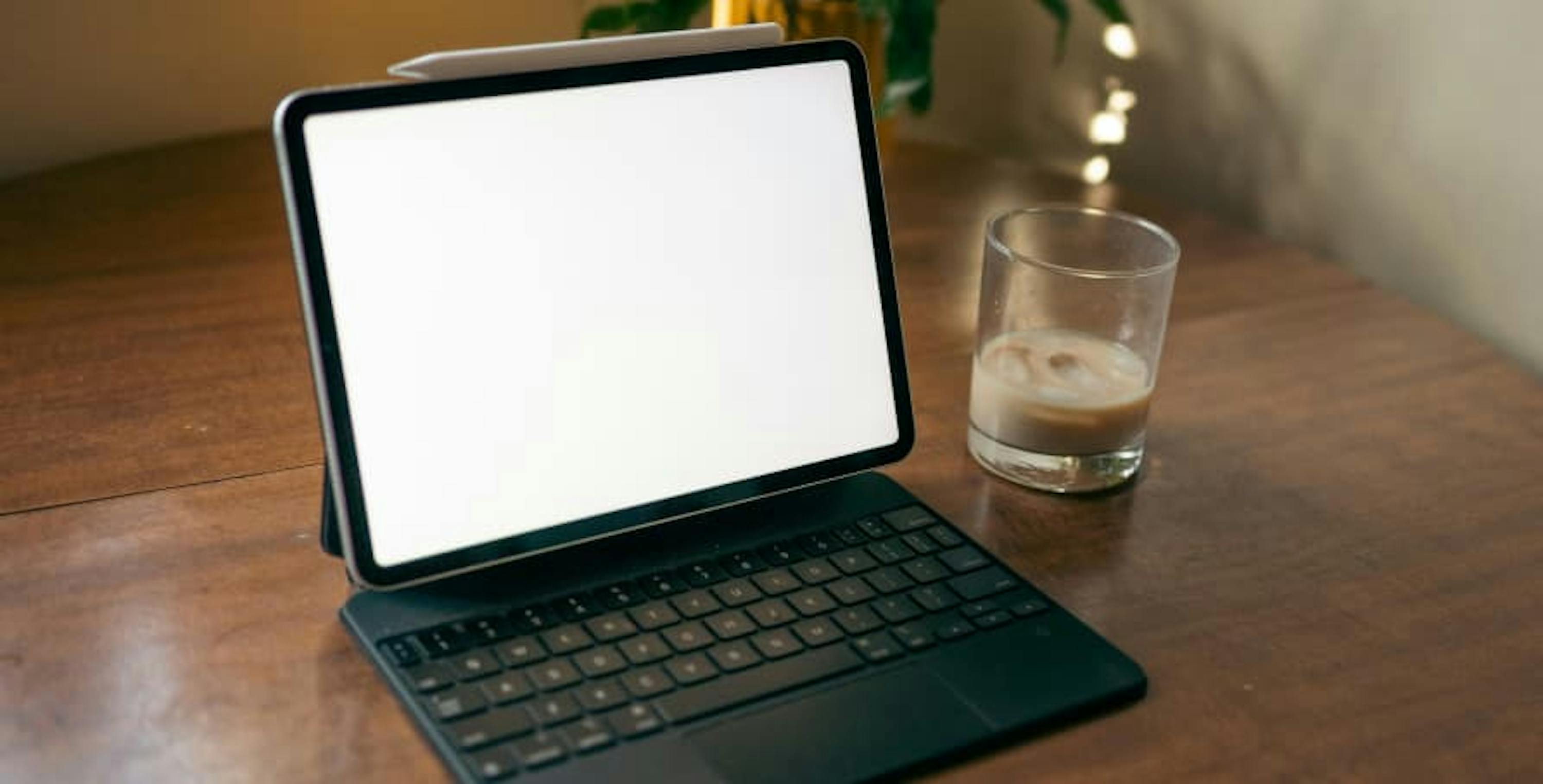 black tablet with keyboard on white screen