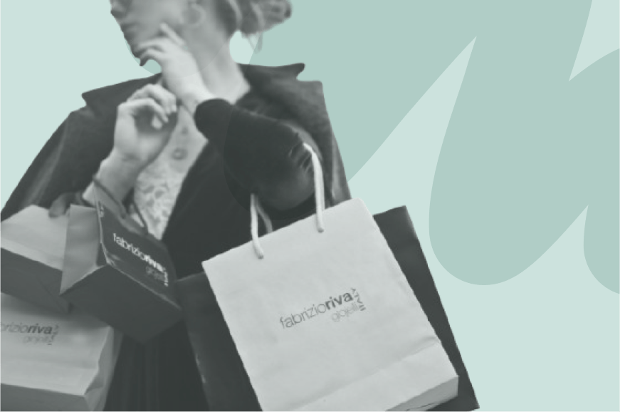 woman holding lots of shopping bags