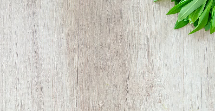 engineered wood with plant in background