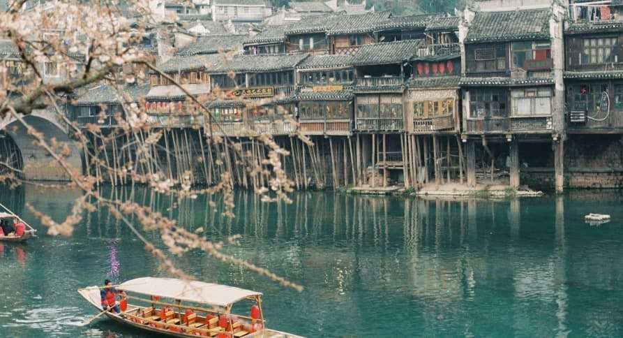 view of chinese houses on water