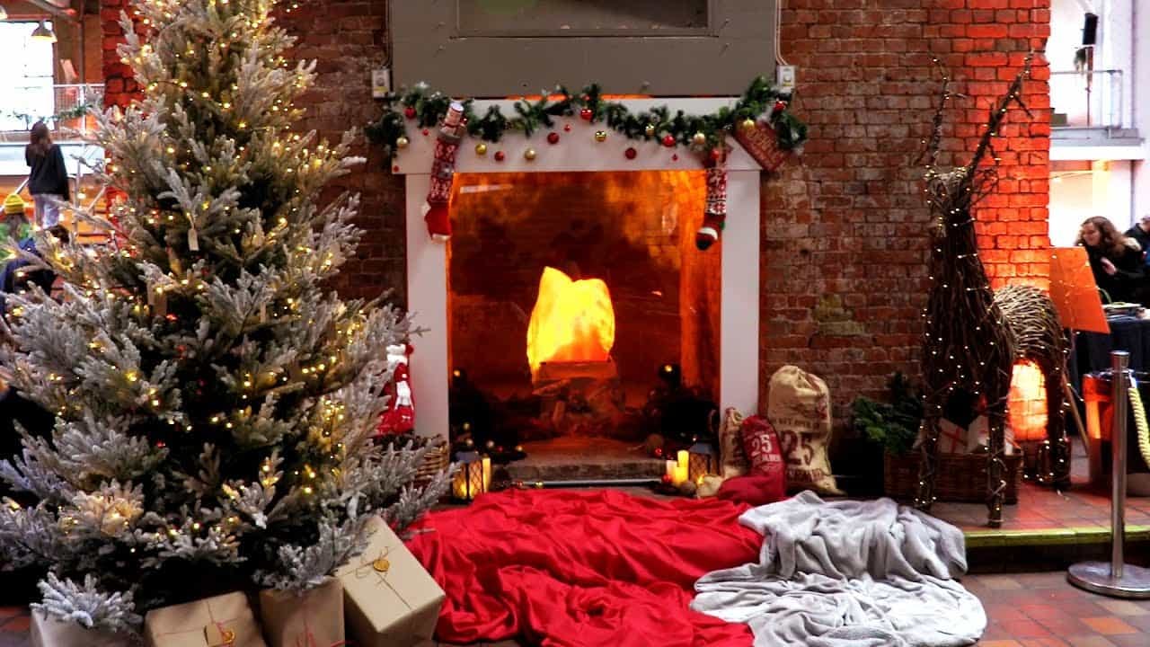 christmas tree near fireplace