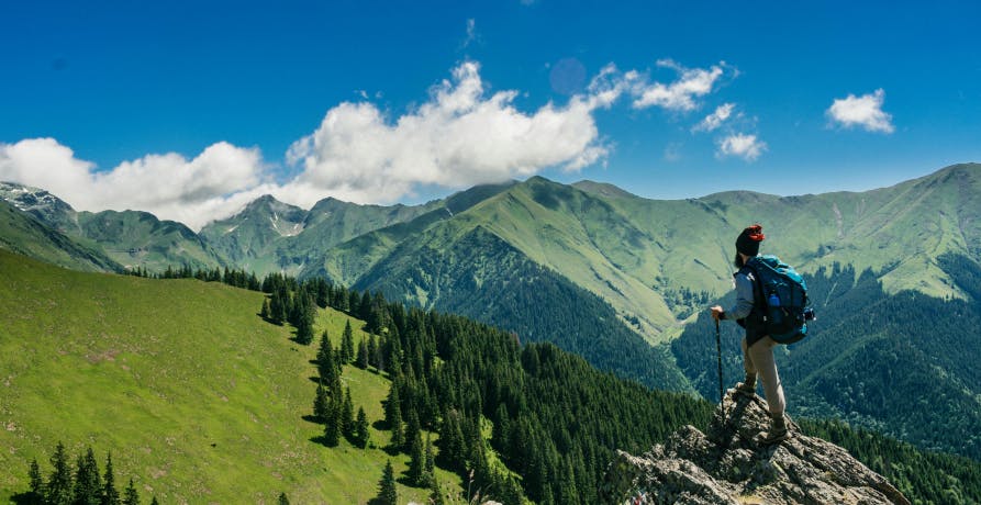 man pratice hiking in moutains