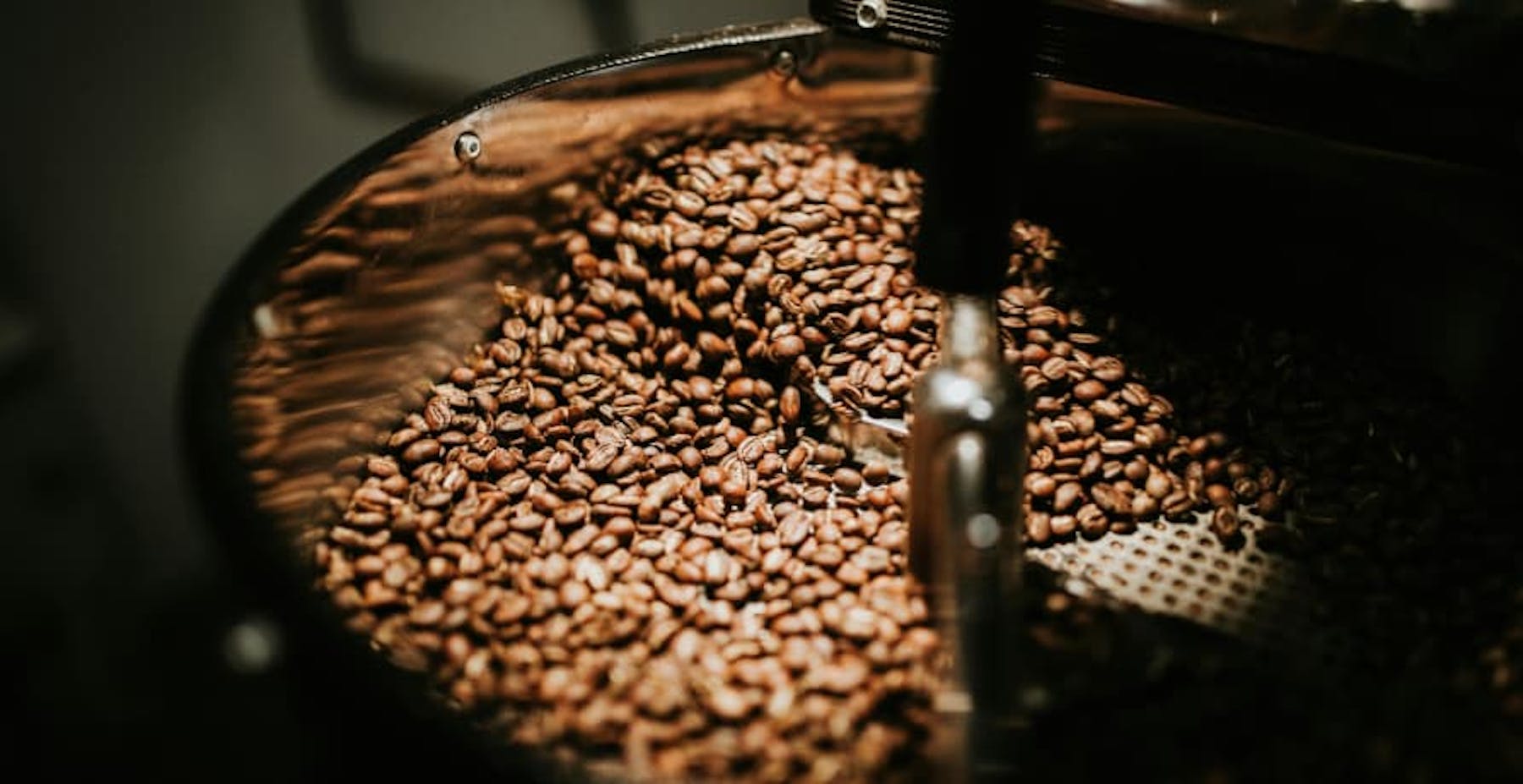coffee beans in a barrel