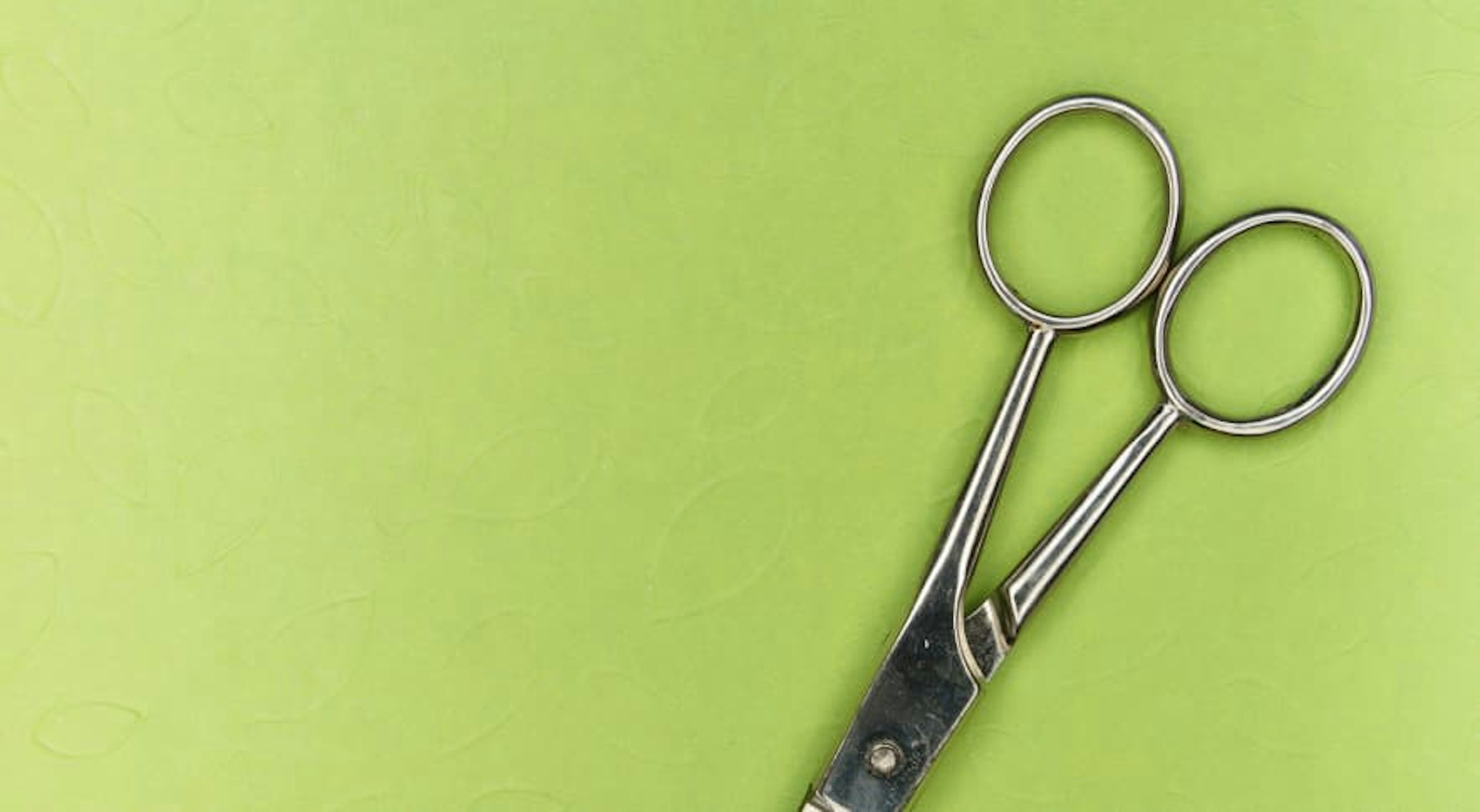 scissors with green background