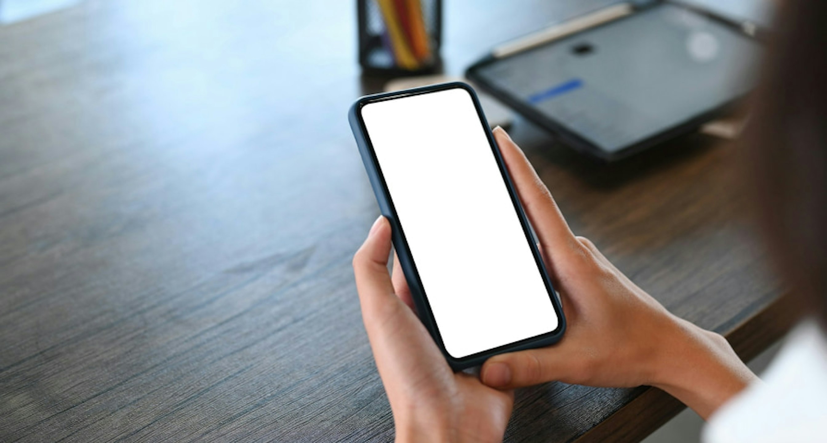 someone holding a mobile phone