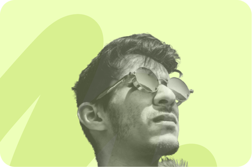 man with sunglasses looking at the sky