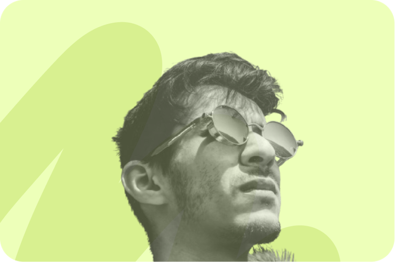man with sunglasses looking at the sky