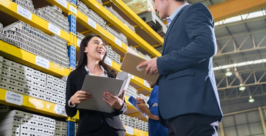 business people in warehouse