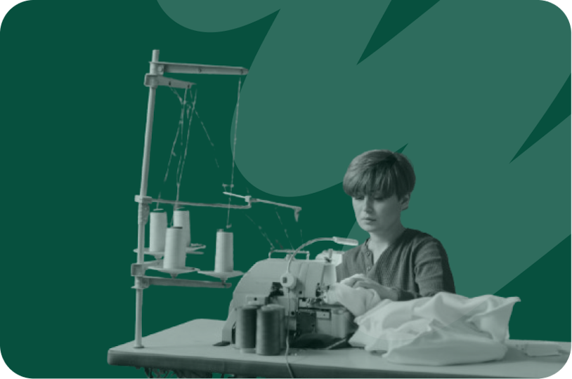 woman in a factory sewing a product