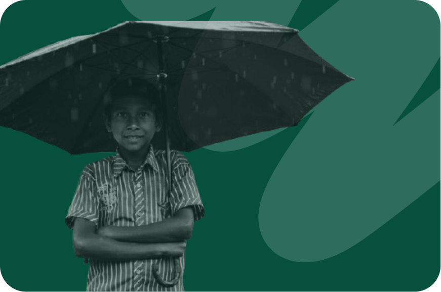 person standing in the rain with their umbrella